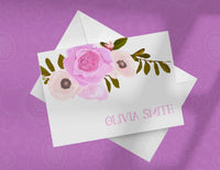 Elegant note card with a floral rose design and a personalized name, Olivia Smith, printed on the front. The card is presented on a purple background with a patterned border.