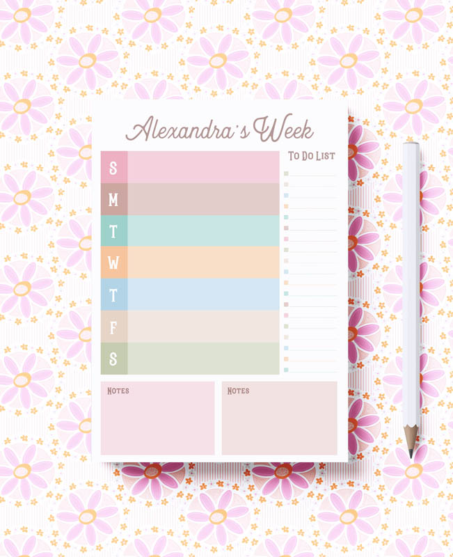 A pastel-colored weekly to-do list notepad with spaces for Monday to Sunday, titled 'Alexandra's Week'. It includes a matching patterned pen.